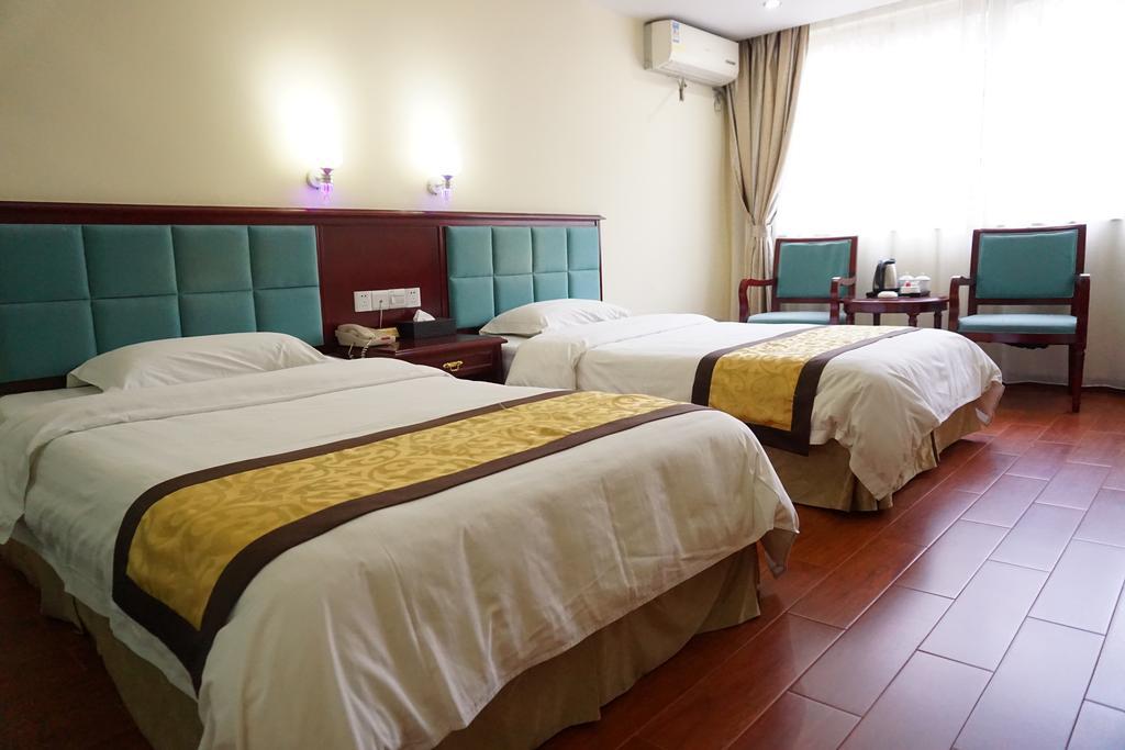Guangdong Oversea Chinese Hotel Cantón Habitación foto