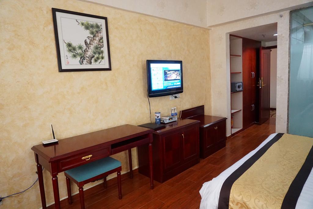 Guangdong Oversea Chinese Hotel Cantón Habitación foto